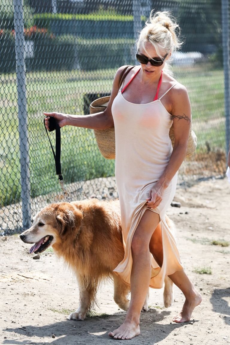 WOMEN.....WITH ANIMALS: CURRENT, MAY, 2013 gallery 80147